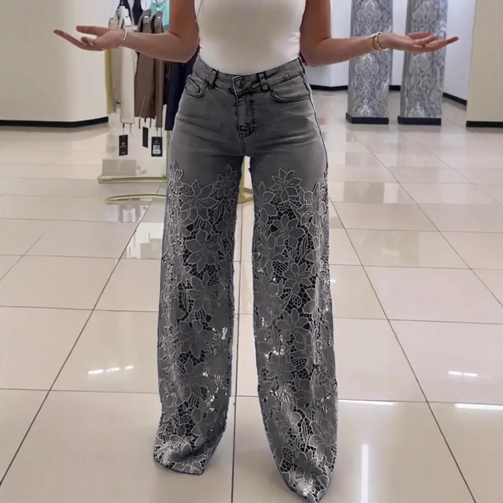 Denim jeans with openwork lace trim