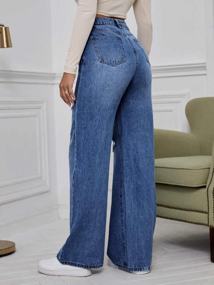 Casual trousers with distressed design