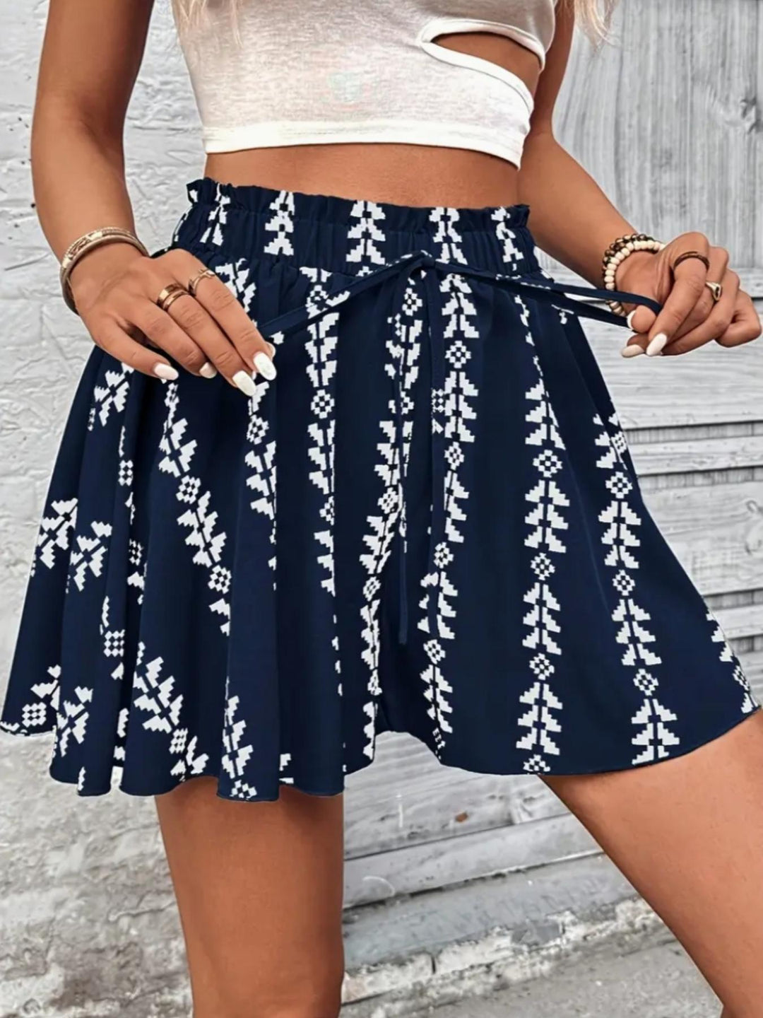 High-waisted A-line printed midi skirt