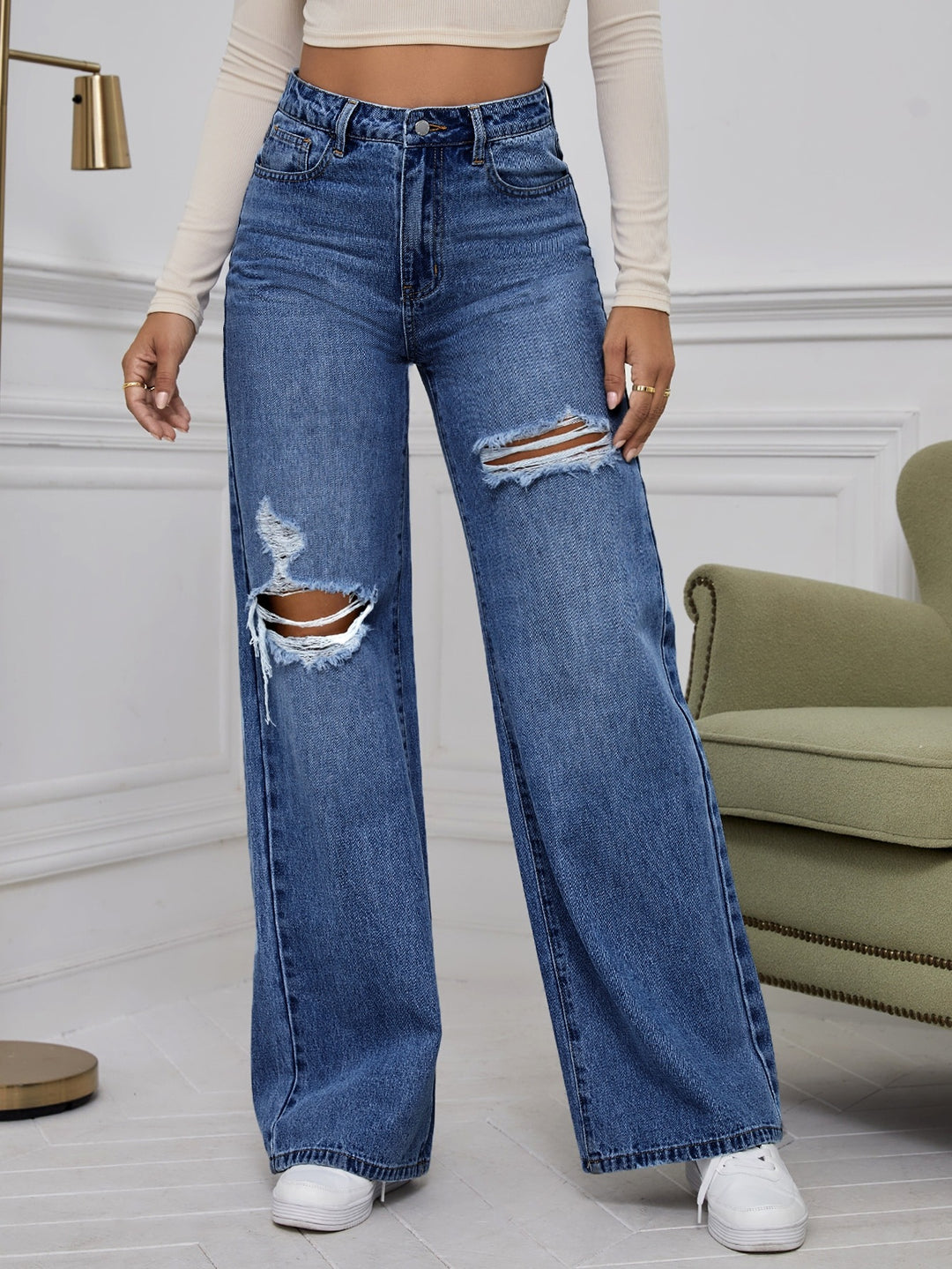 Casual trousers with distressed design