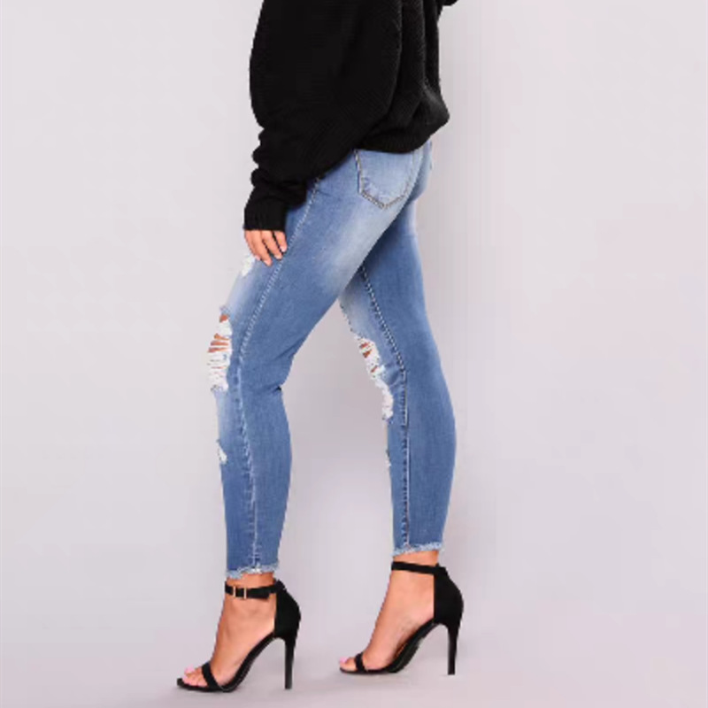 High-waisted skinny ripped jeans