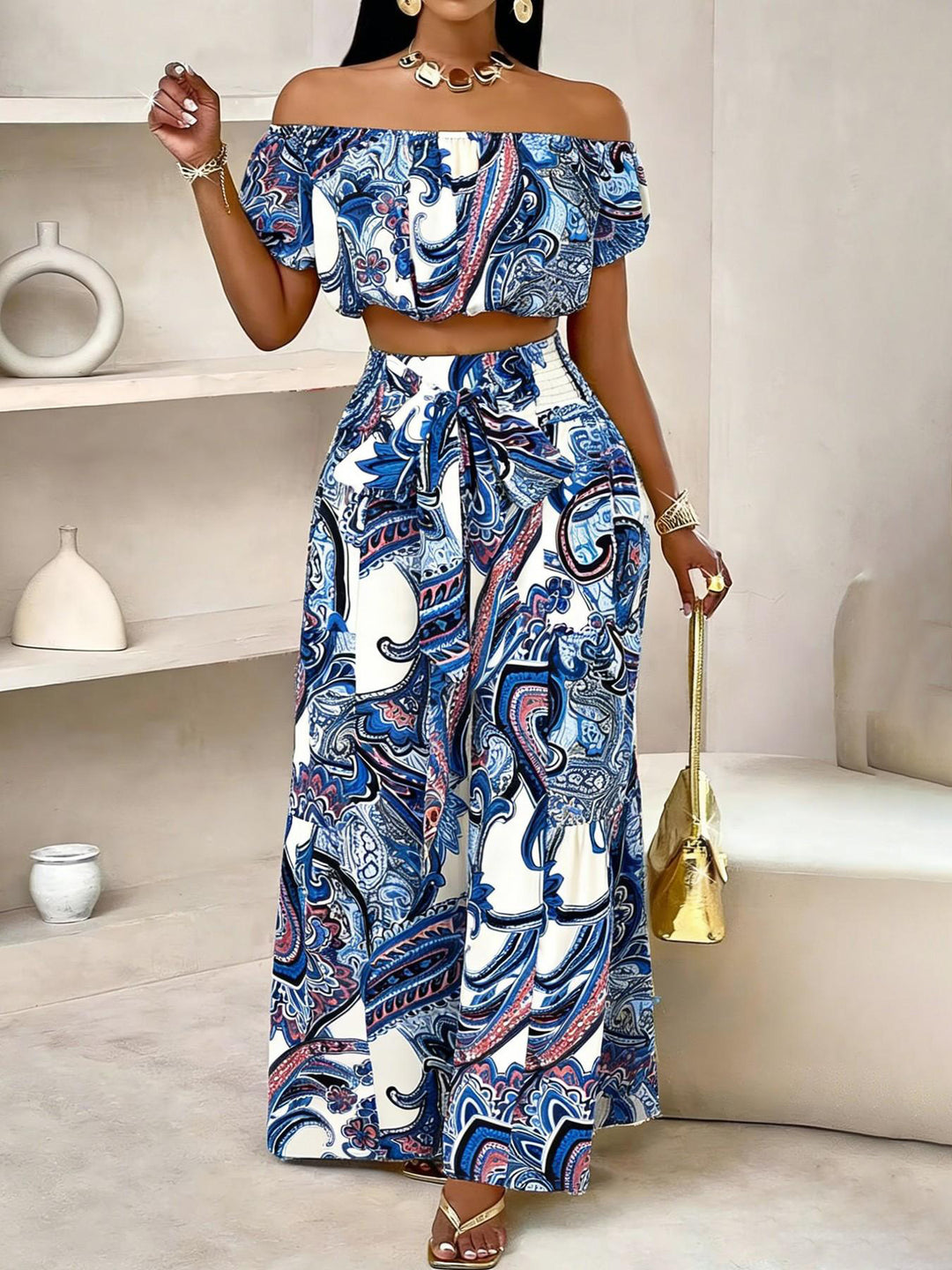 Printed off-shoulder top and high-waisted trousers two-piece set