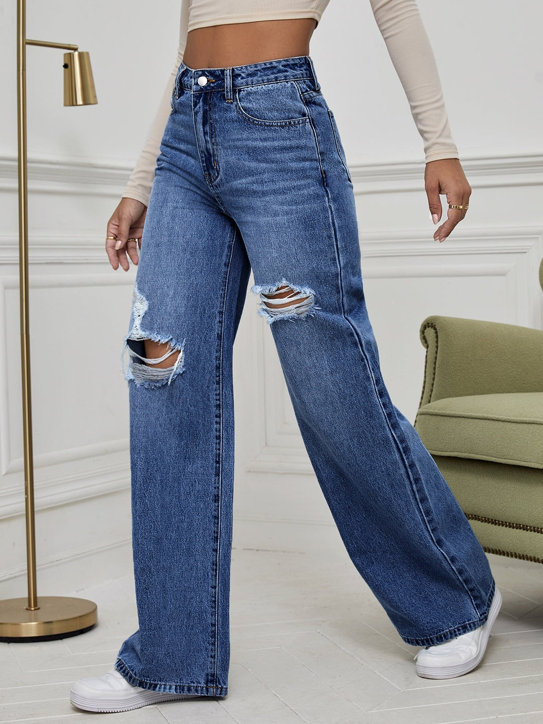 Casual trousers with distressed design