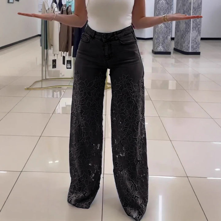 Denim jeans with openwork lace trim