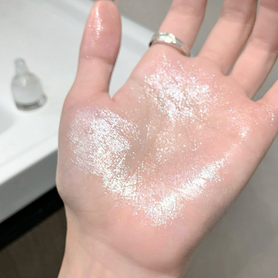 Liquid shimmering highlighter - sparkling rhinestones for face and body