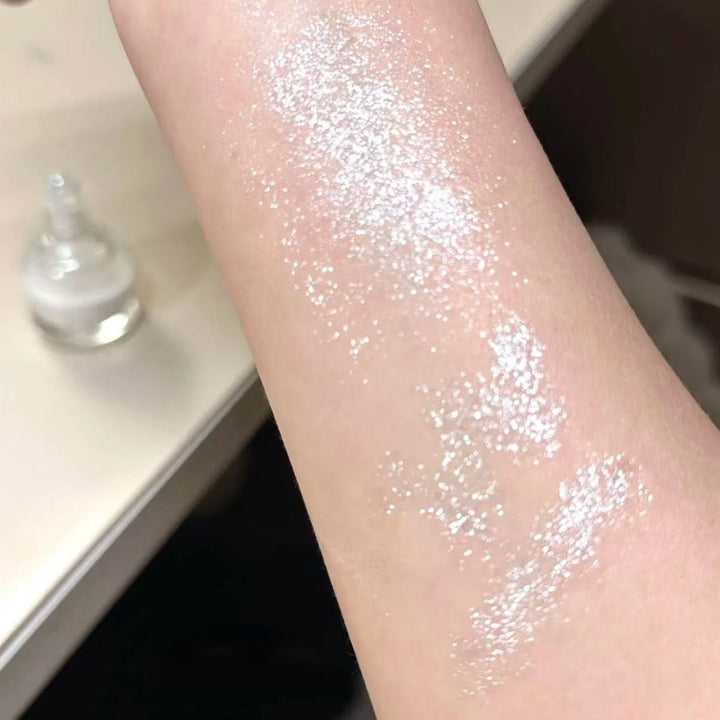 Liquid shimmering highlighter - sparkling rhinestones for face and body