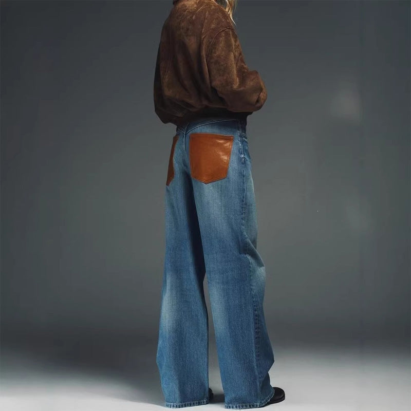 Leather patchwork washed denim jeans
