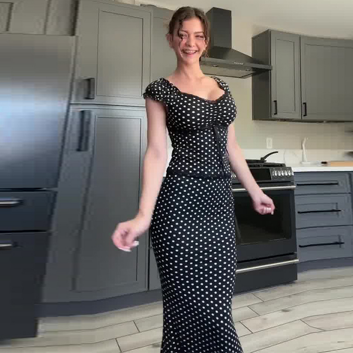 Sleeveless polka dot black bodycon suit