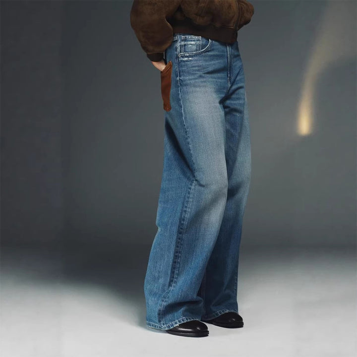Leather patchwork washed denim jeans