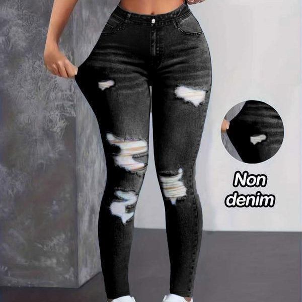 High-waisted stretch ripped skinny jeans