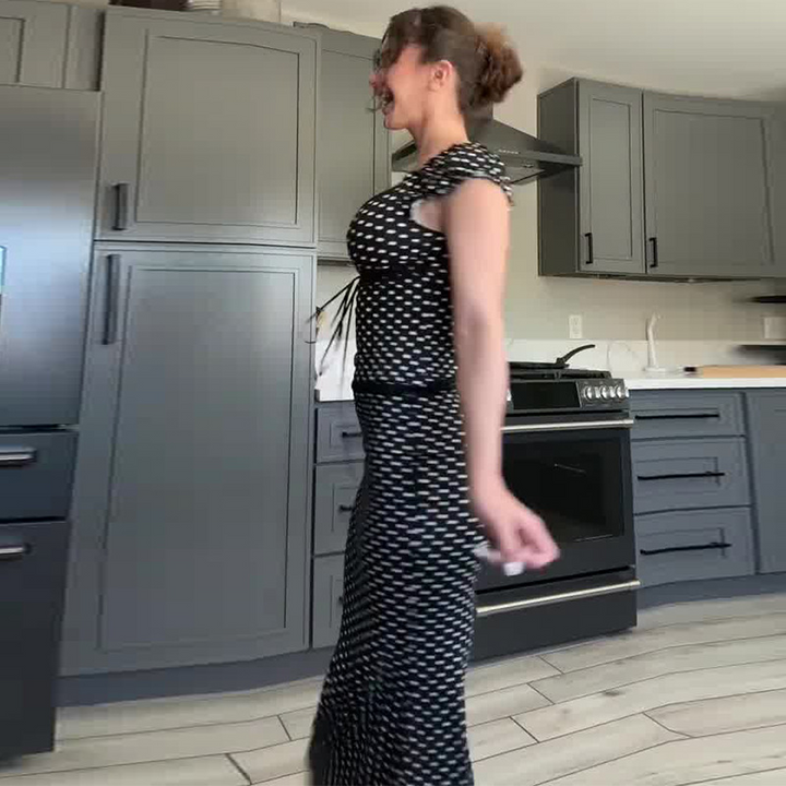 Sleeveless polka dot black bodycon suit