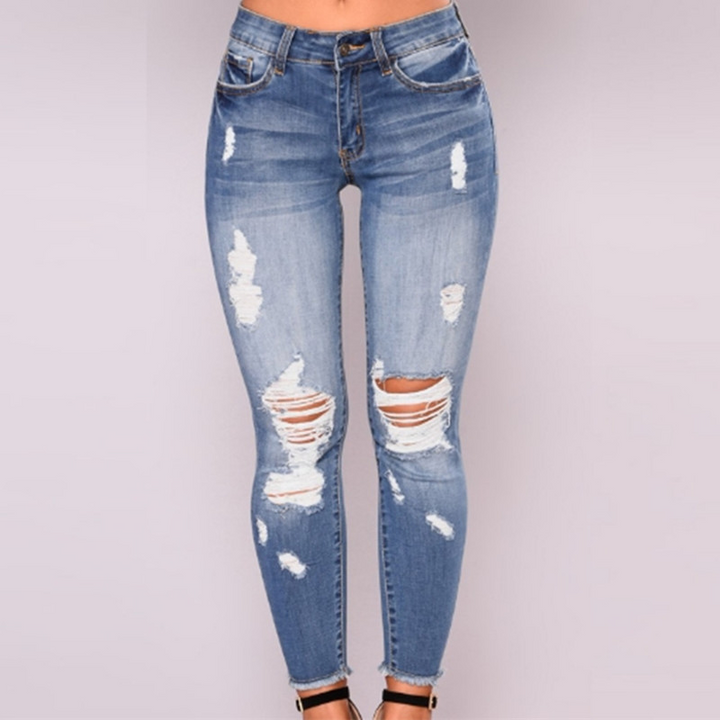 High-waisted skinny ripped jeans